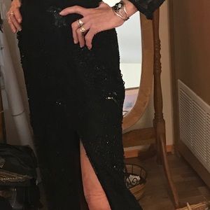 Black beaded evening dress. Floor length